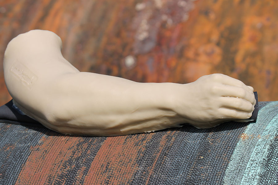 Synthetic rubber arm SAS