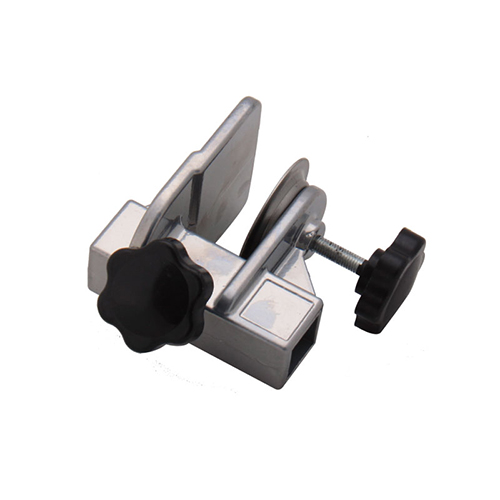 Clamp for grooming arm